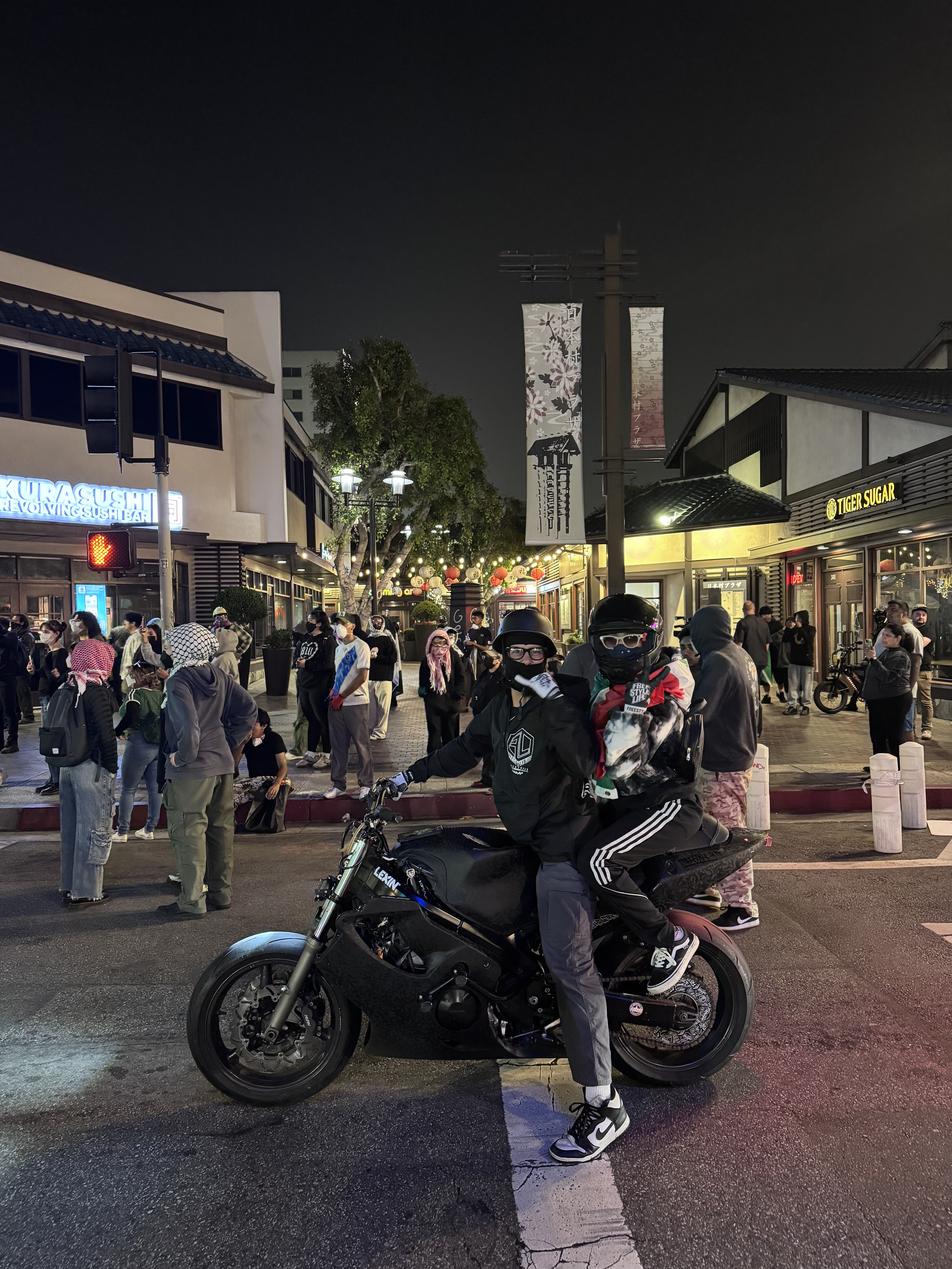 Couple posing on bike