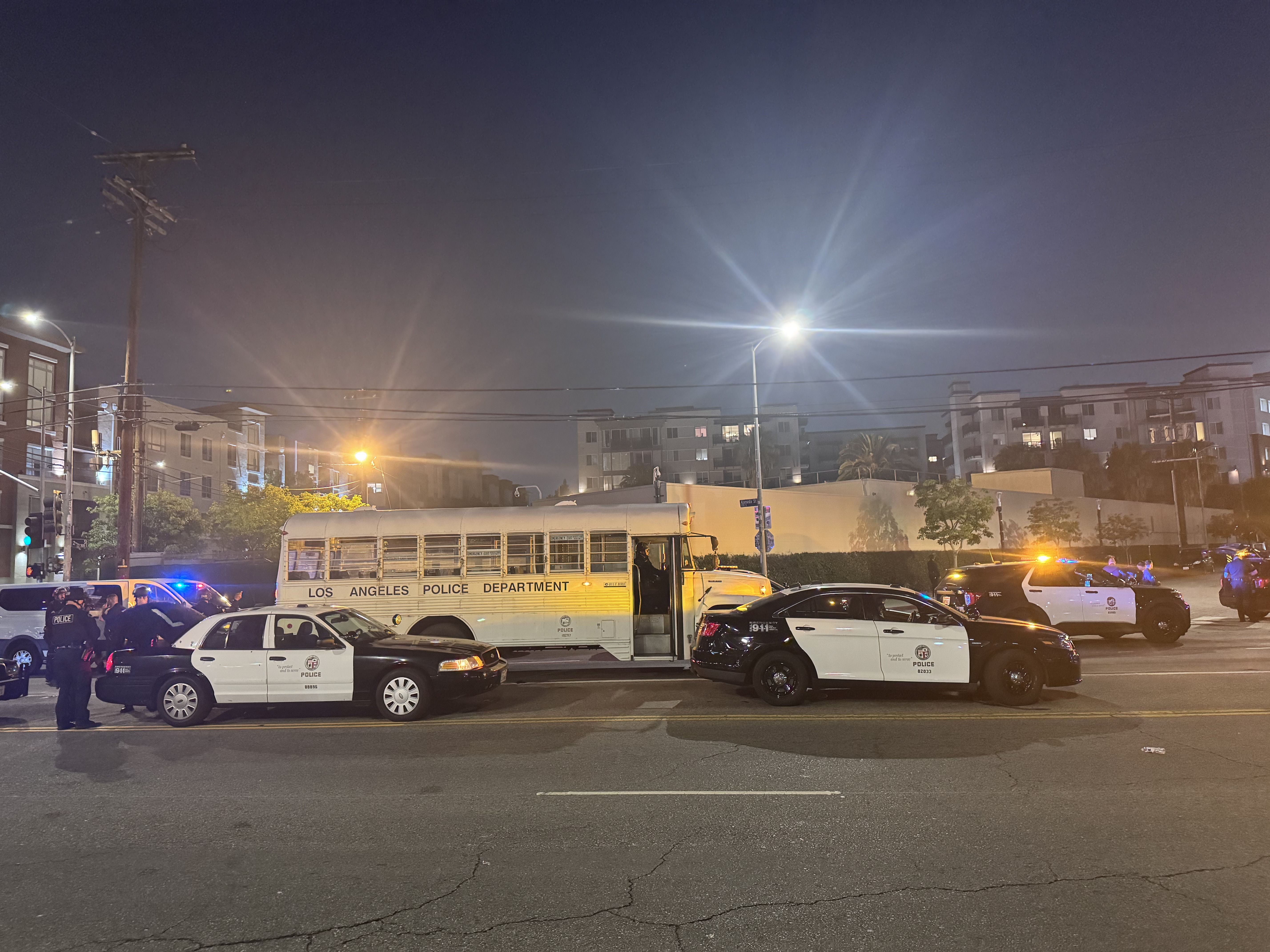 Cops in a line of cars
