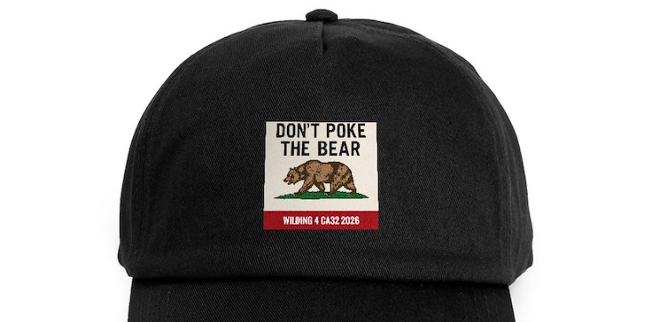 A black cap with WILDING 4 CA on it