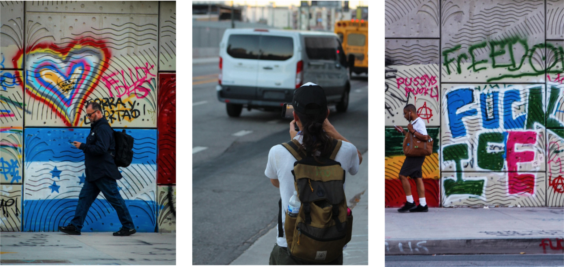 A man walking looking at his phone, woman in backpack taking photo of a van; man walking looking at phone