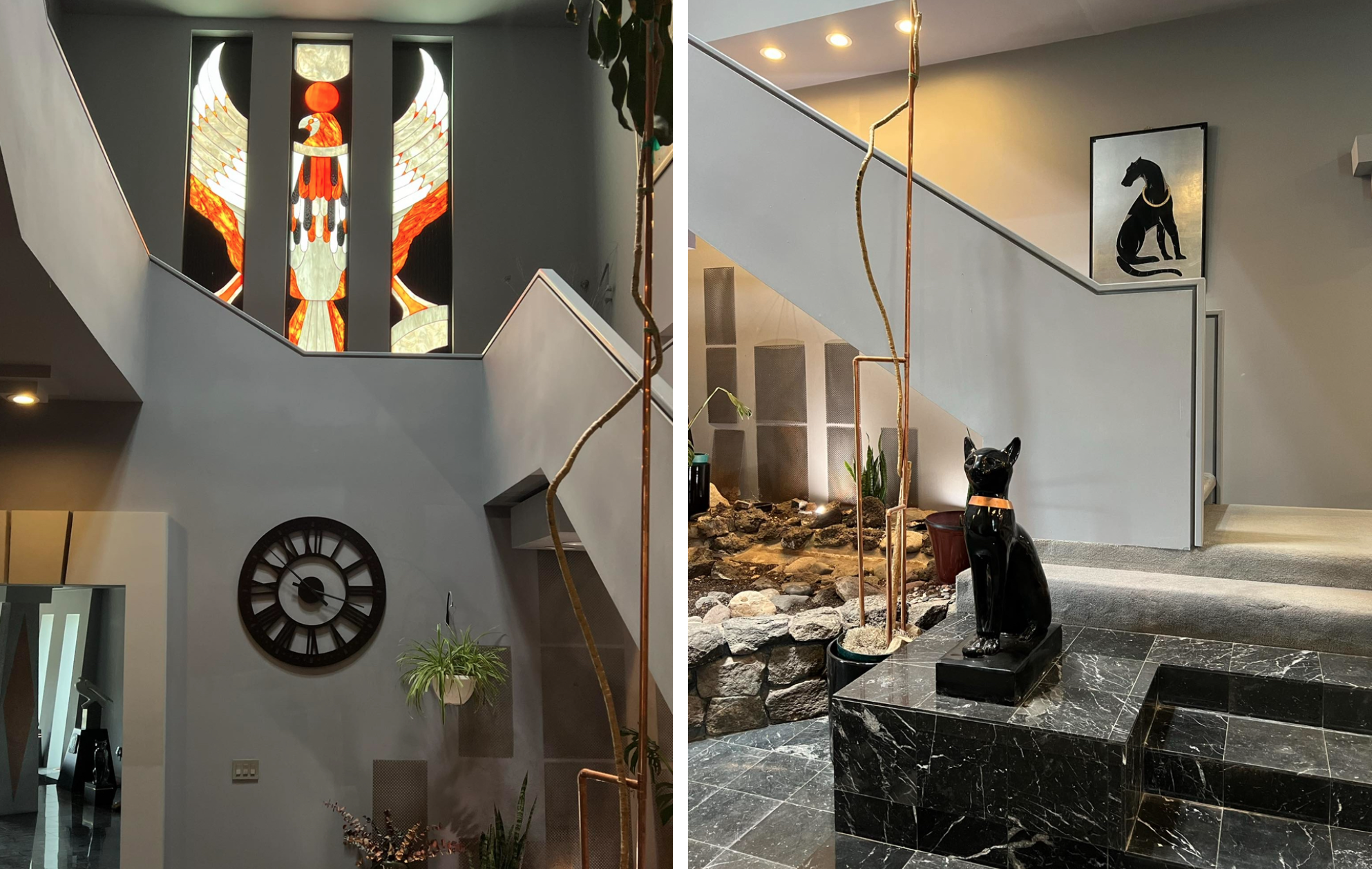 Stain glass window of a phoenix and a large black cat statue and a dog painting