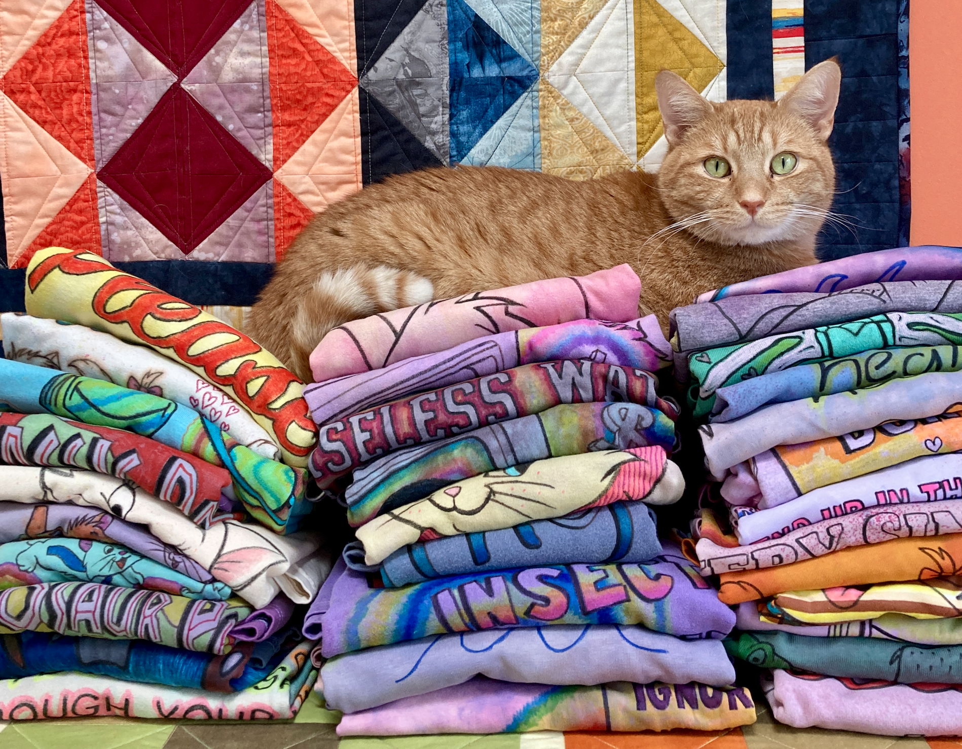 Jess's work being sat on by a cat