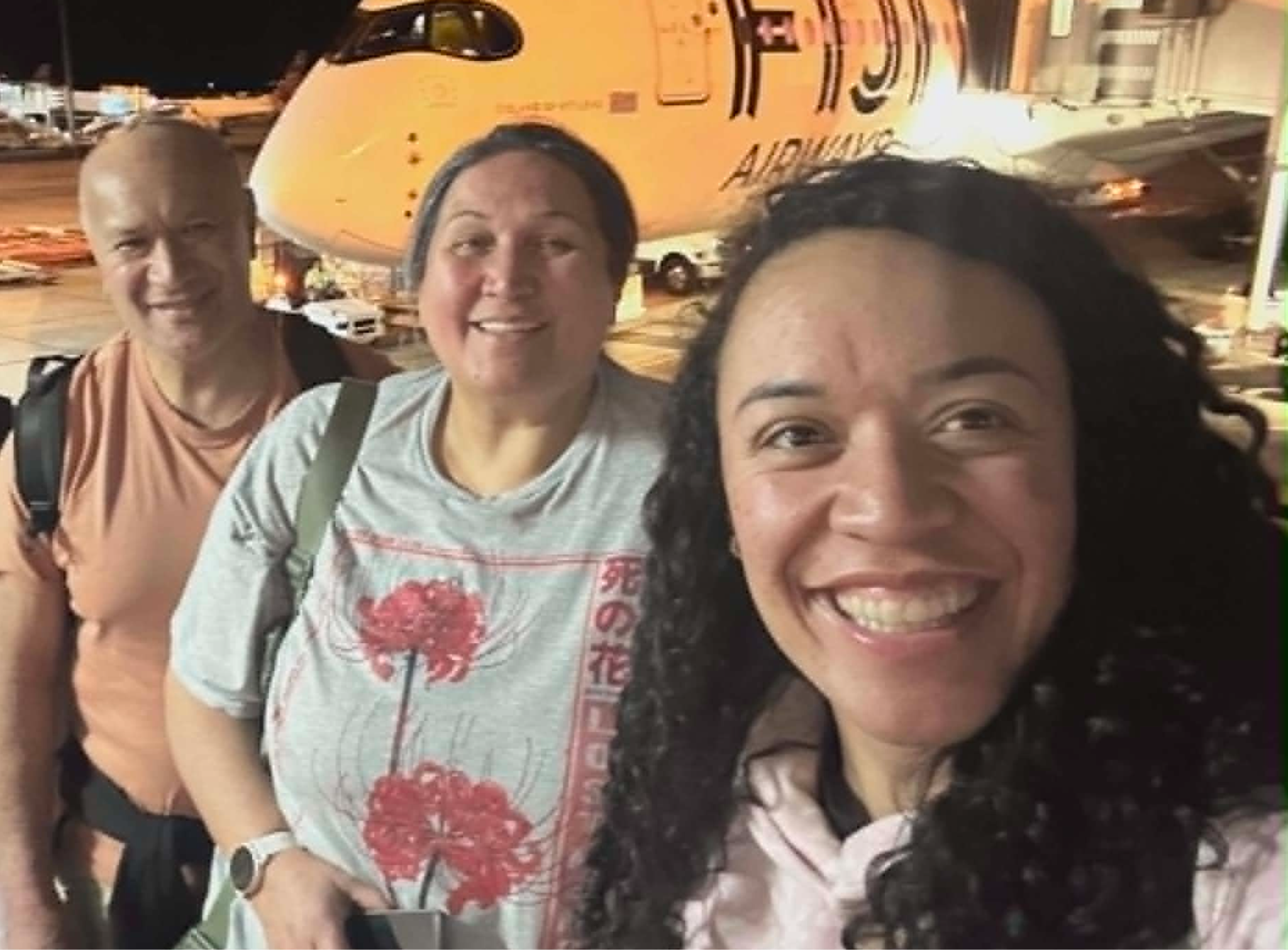 Everlee (right) with parents Betty and Gordon, travelling to New Zealand via Fiji.