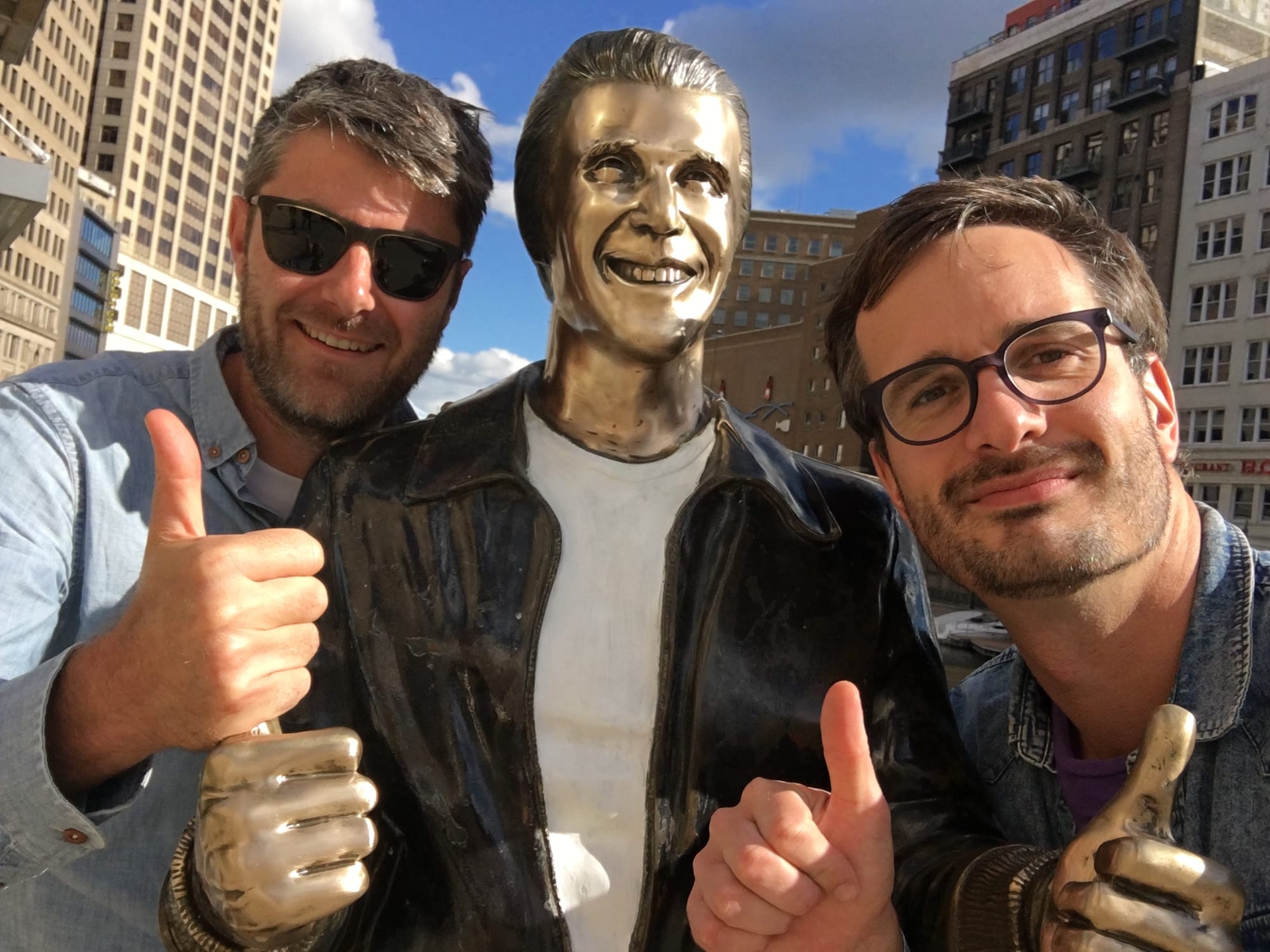 Carthew and me and the Fonz statue giving the thumbs up