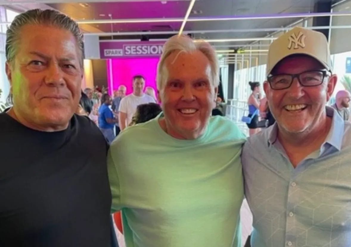 Church leaders mugging to camera with Brian Tamaki