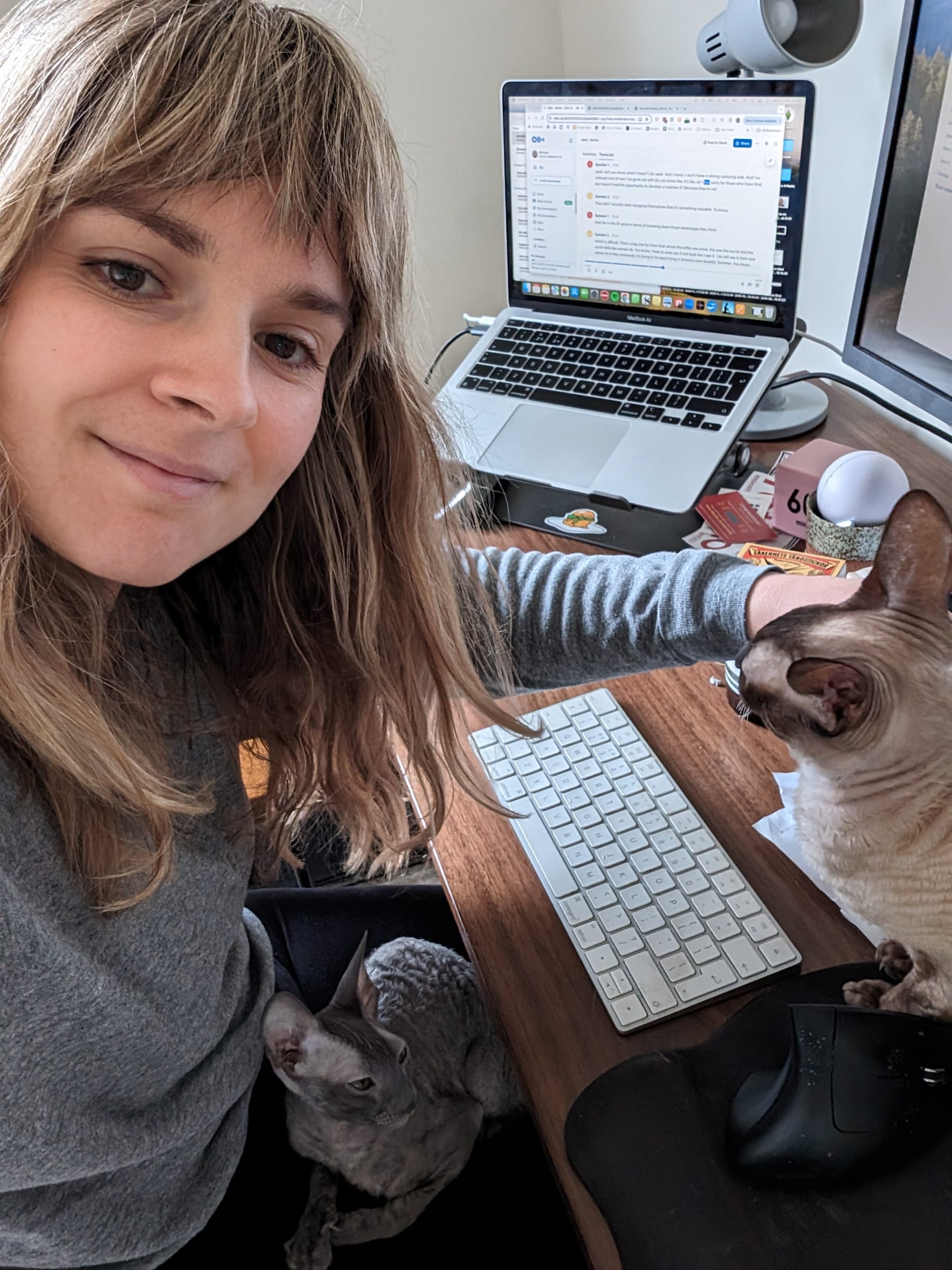 Elle Hunt with two cats