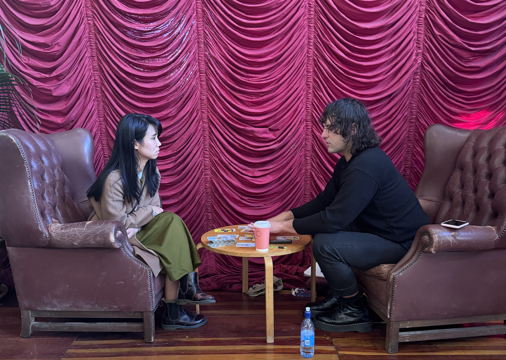 Sam giving an erotic tarot card reading