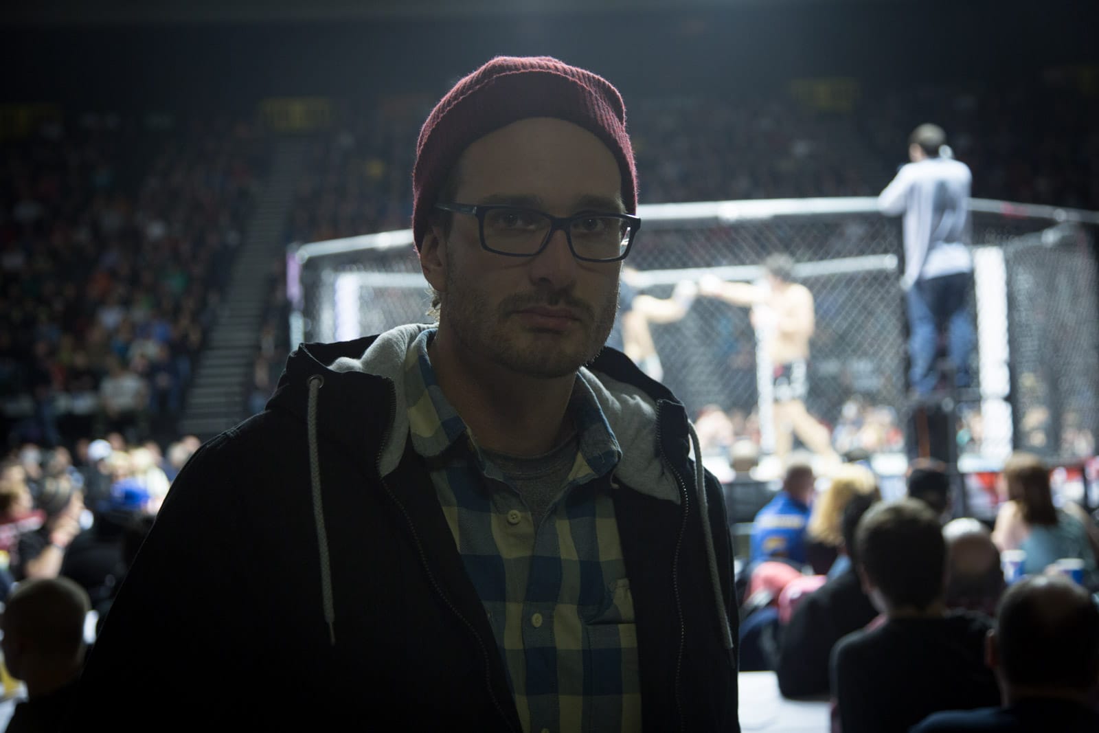 Me with MMA ring behind me