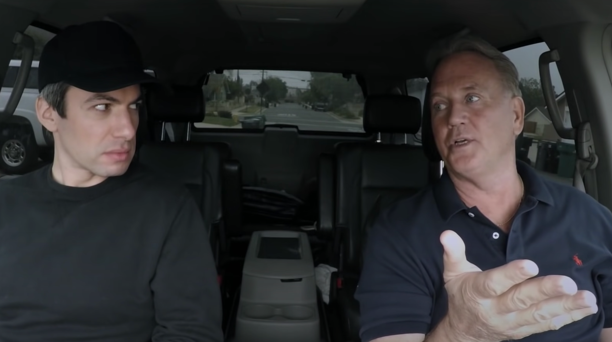 Nathan Fielder and PI Brian Wolfe in a car