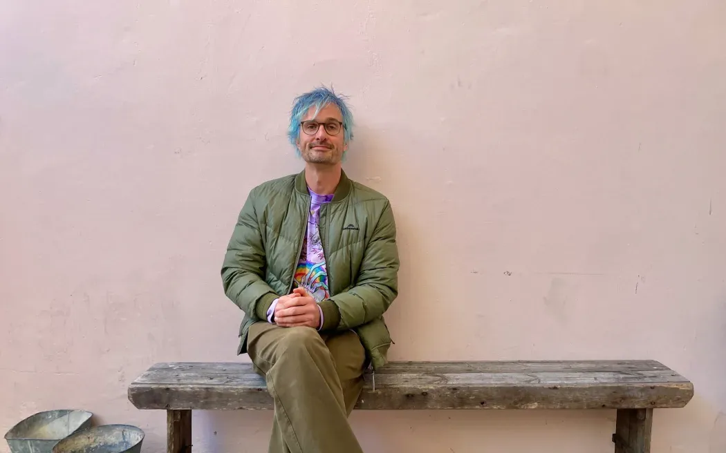 Me sitting outside at the Webworm popup