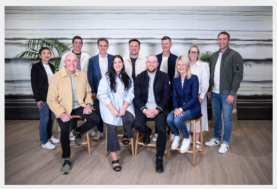 A sea of mostly white beaming faces