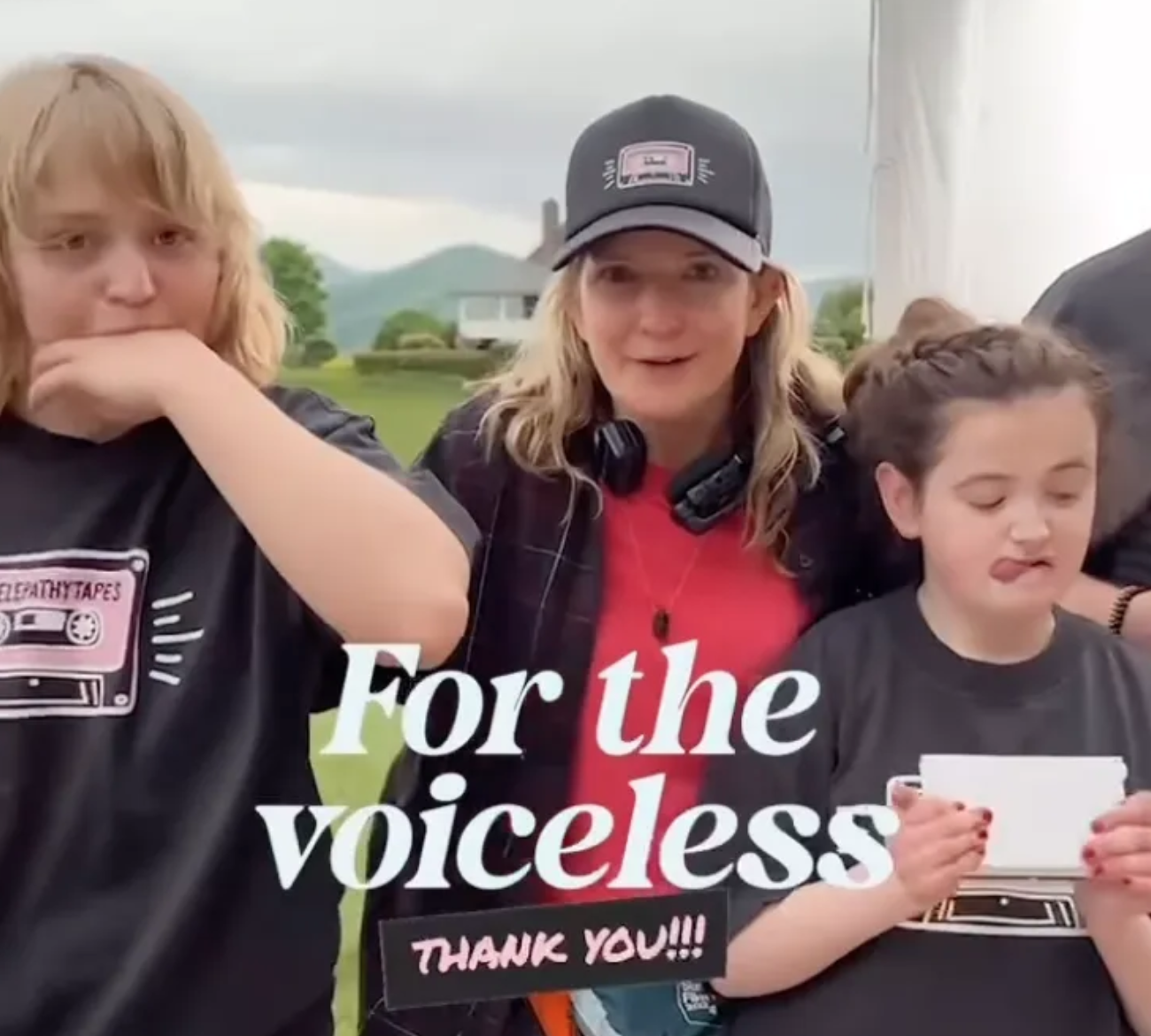 Ky hugging some autistic children