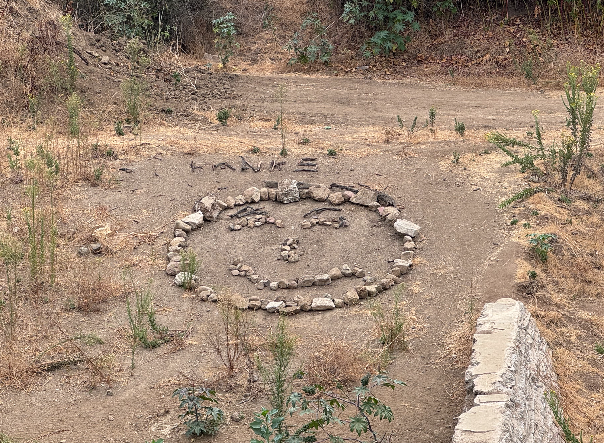 A smiley face in rocks