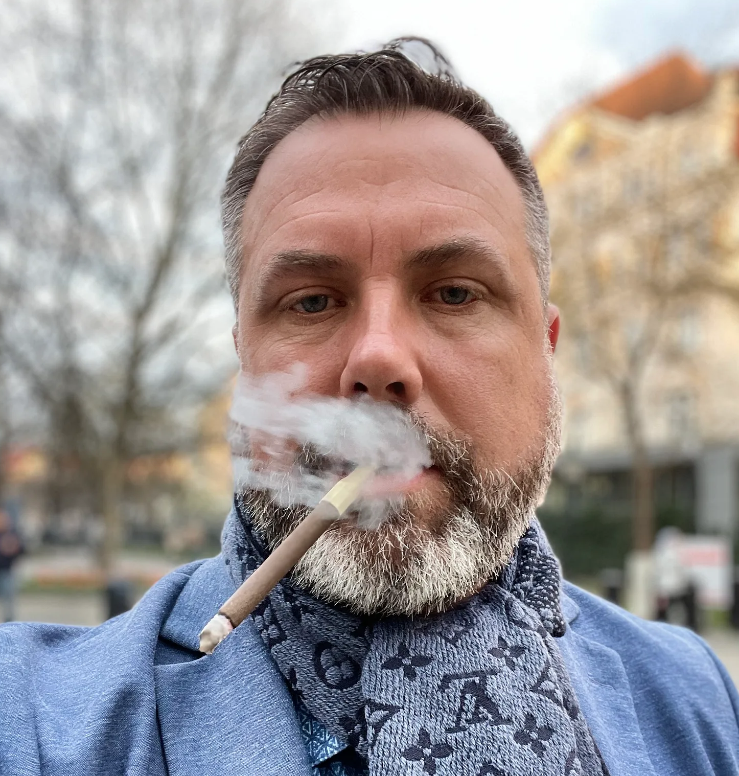 Seeby Woodhouse smoking a cigar
