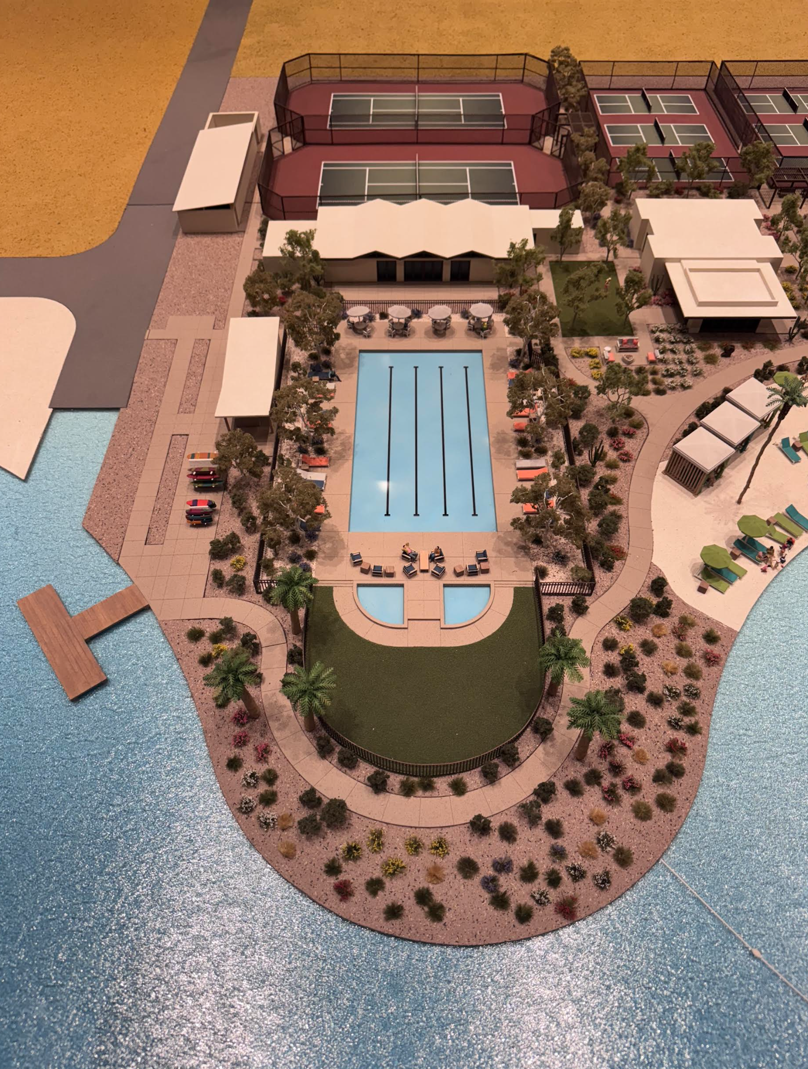The next photos are all perfect tiny replicas of the amazing Disneytown with a beachfront lake and pools and tennis courts
