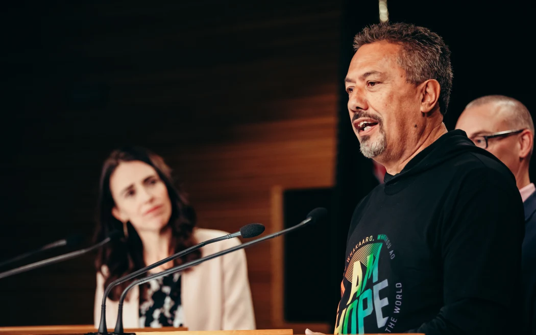 Mike King, flanked by prime minister Jacinda Ardern and health minister David Clark