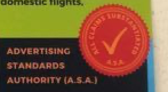 A red stamp with a tick of approval