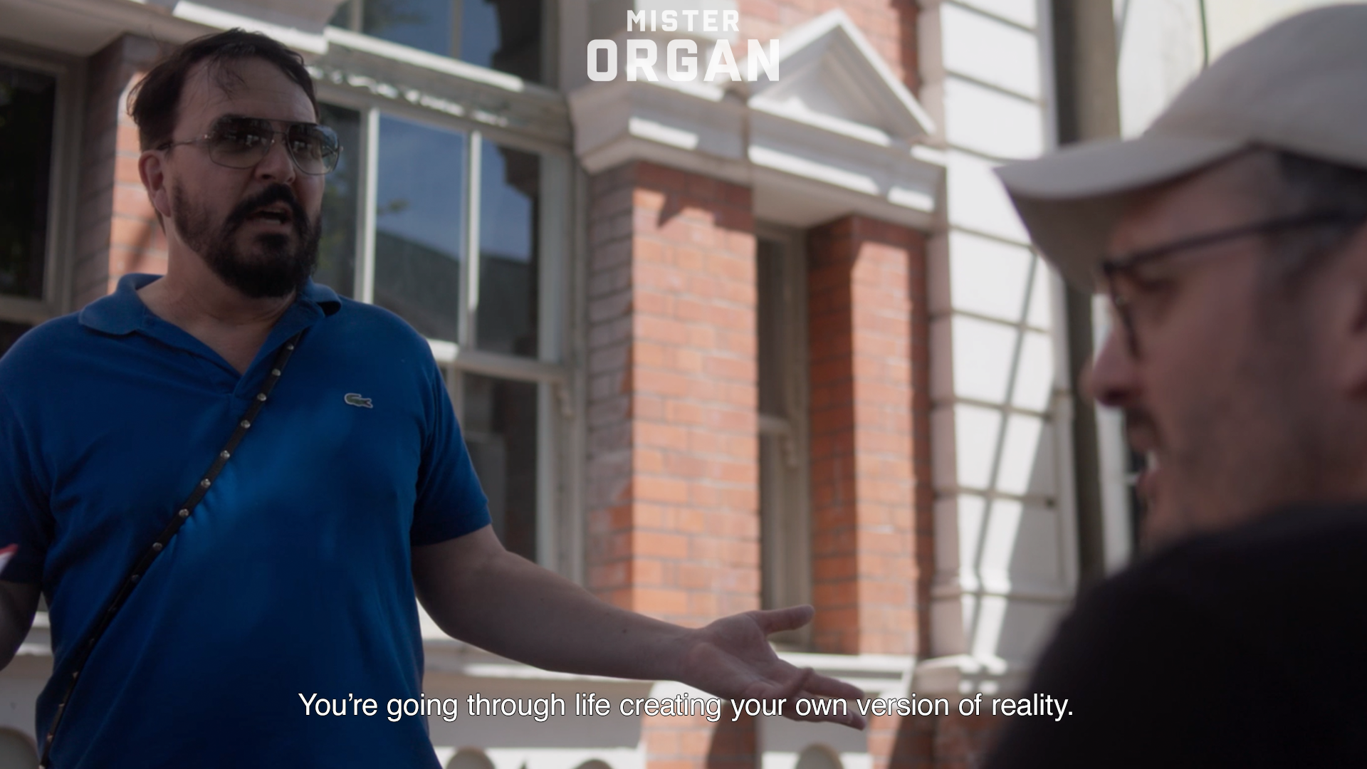 A scene from Mister Organ as I tell him "You're going through life creating your own version of reality"