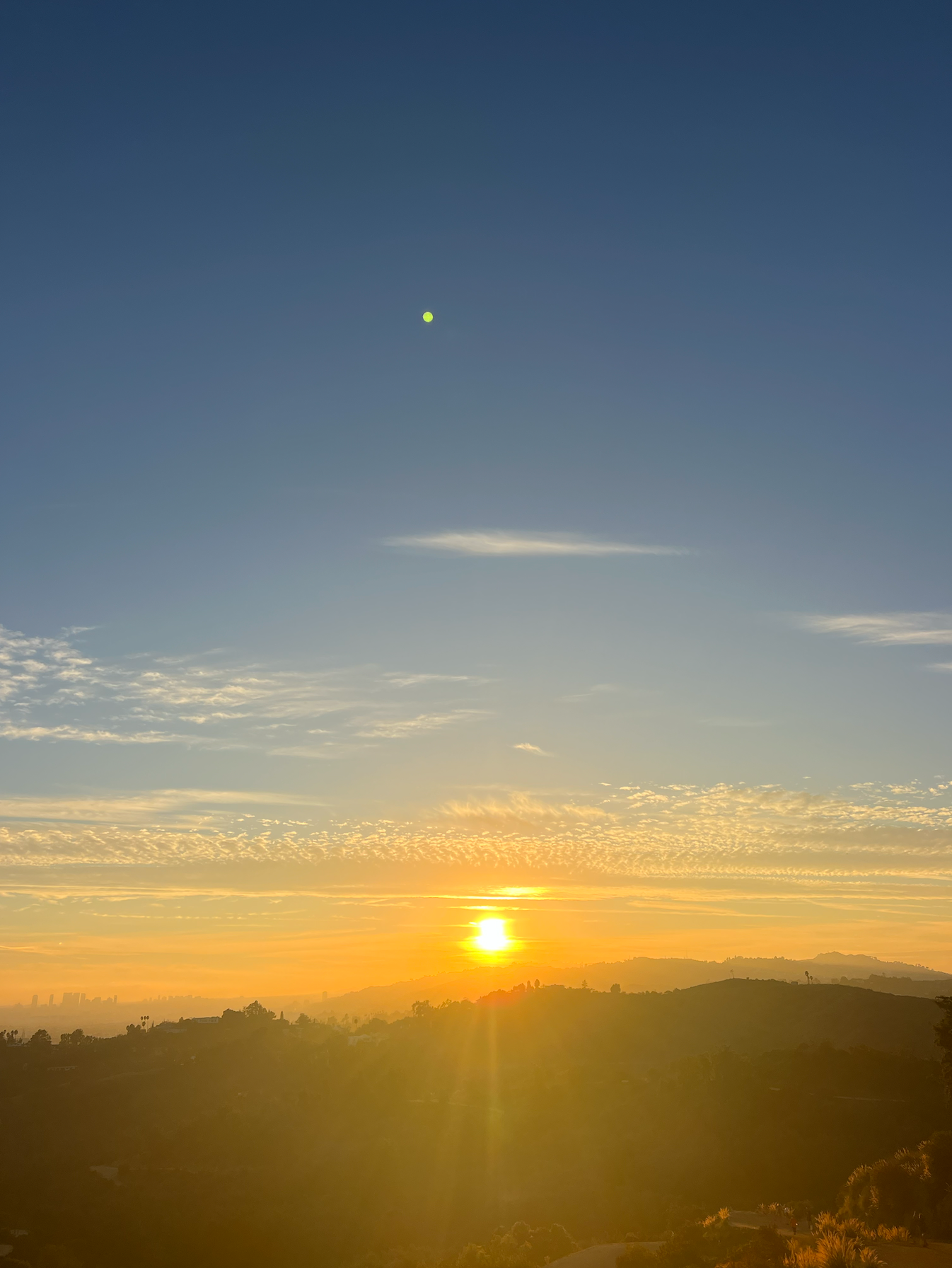 A sunset up a hill in California
