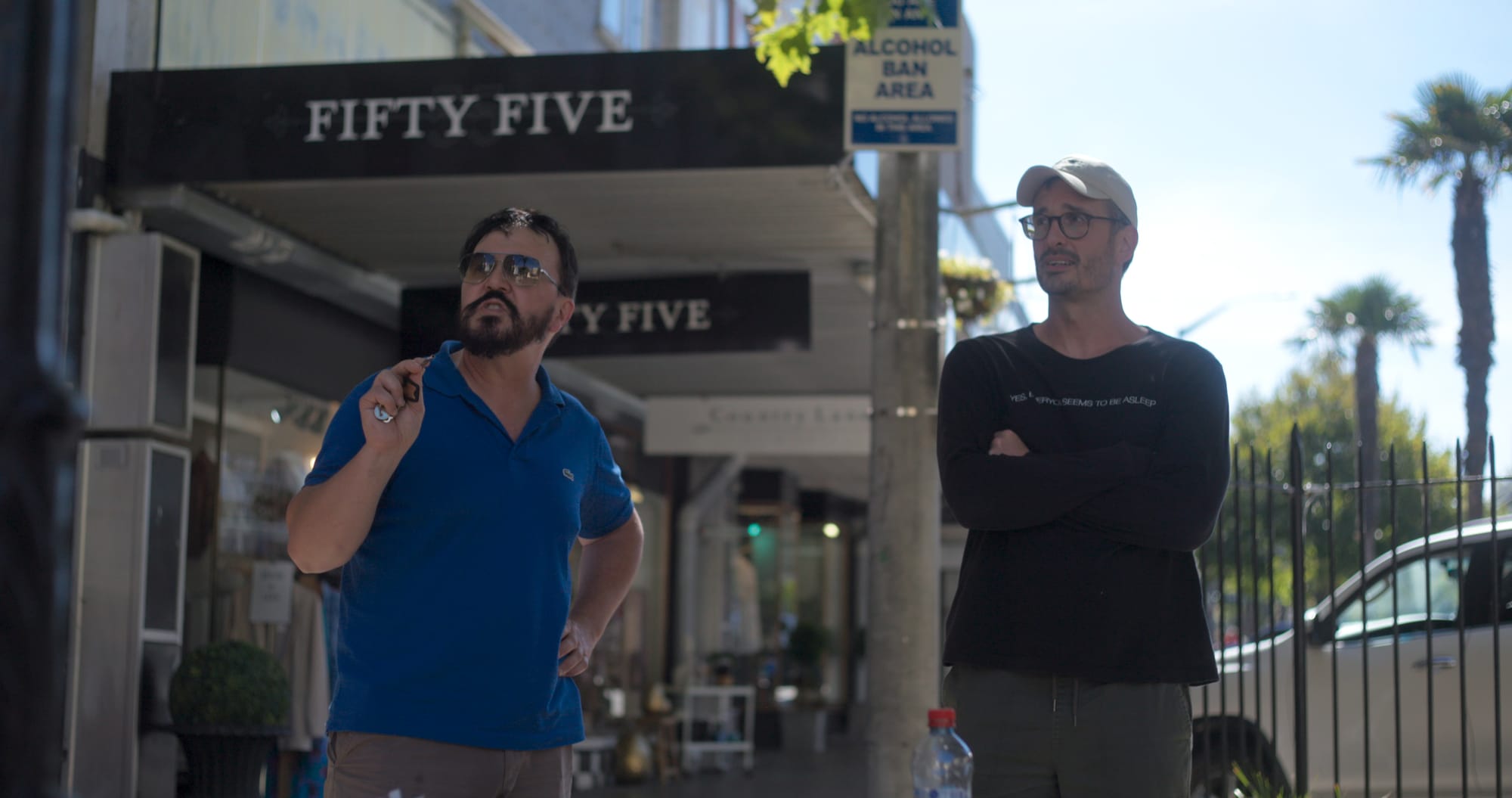 Me and Mister Organ on street, as Mister Organ argues