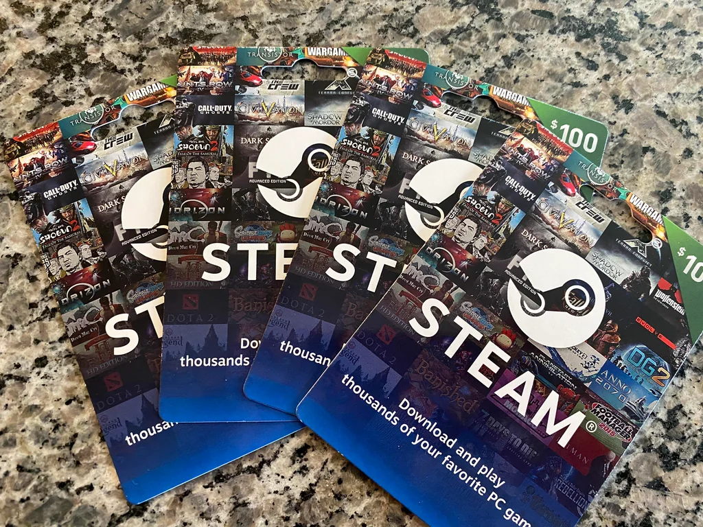 Steam gift cards on a table