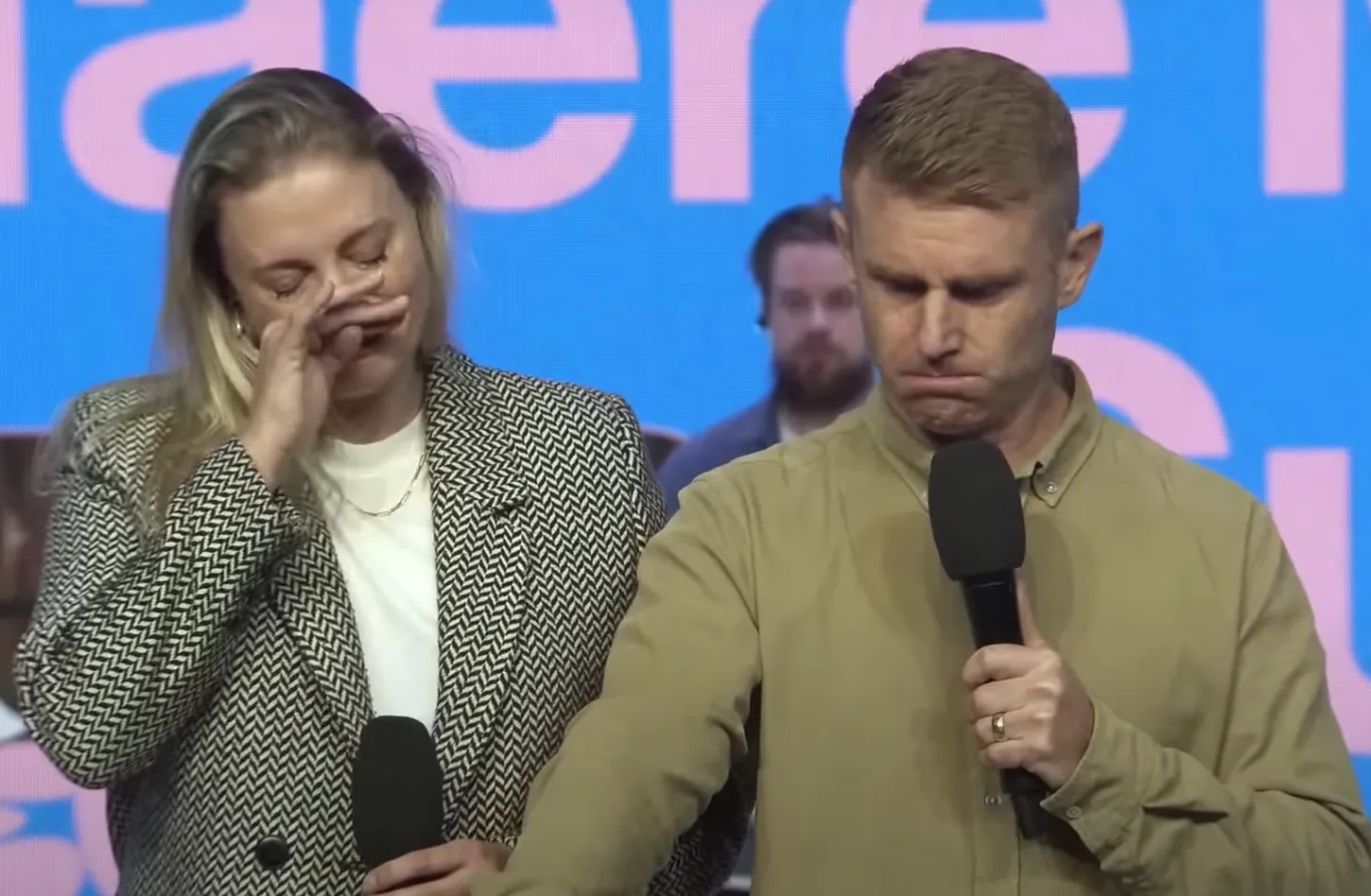 John Cameron crying on stage at Arise