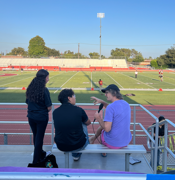 Me working on an upcoming story, talking to some kids about the US.