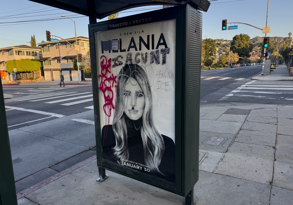 A defaced Melania poster in my neighbourhood