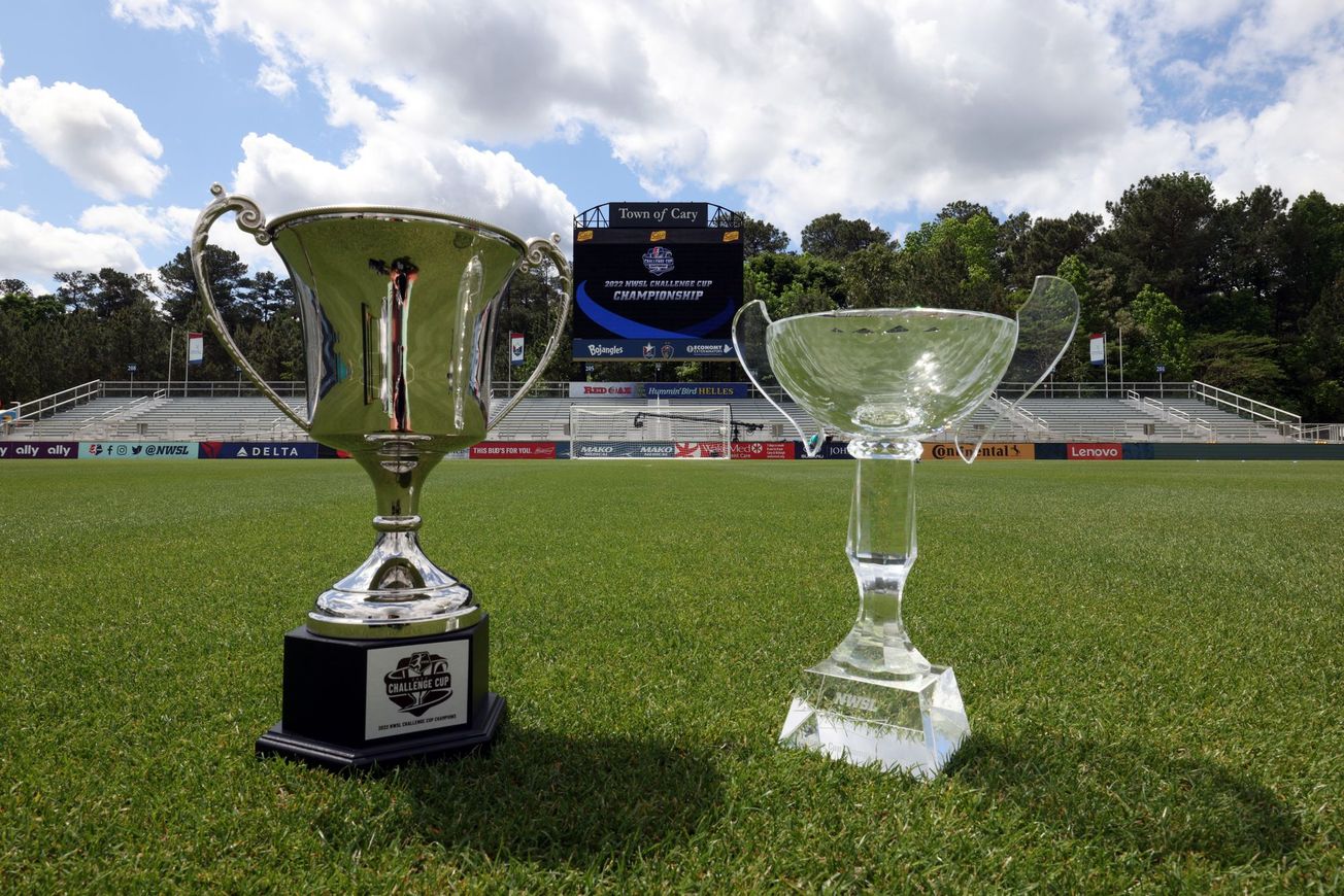 The NWSL Challenge Cup Final trophy and MVP trophy displayed ahead of the 2022 final.