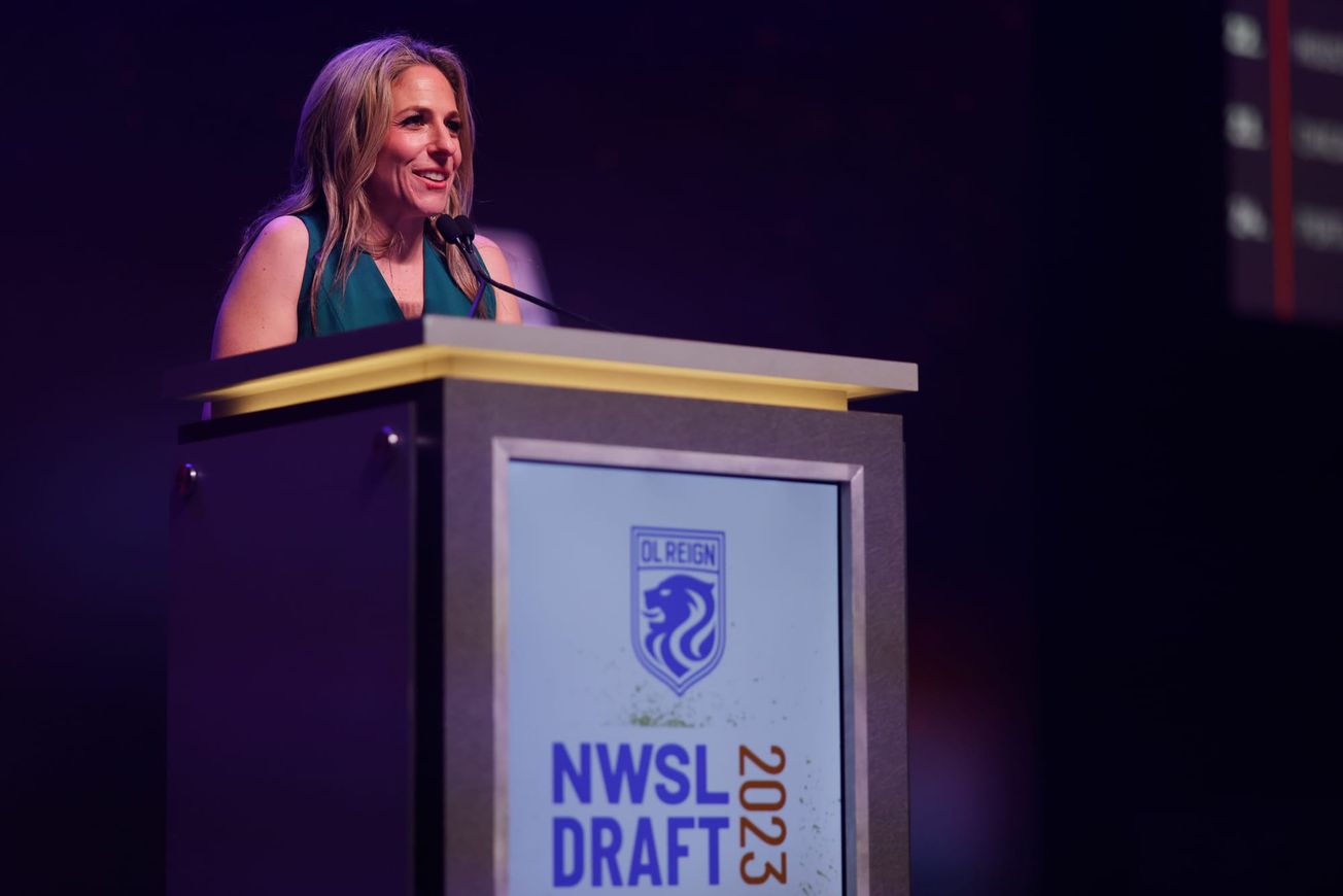 NWSL Commissioner Jessica Berman at the podium during the 2023 NWSL Draft, with OL Reign on the clock.