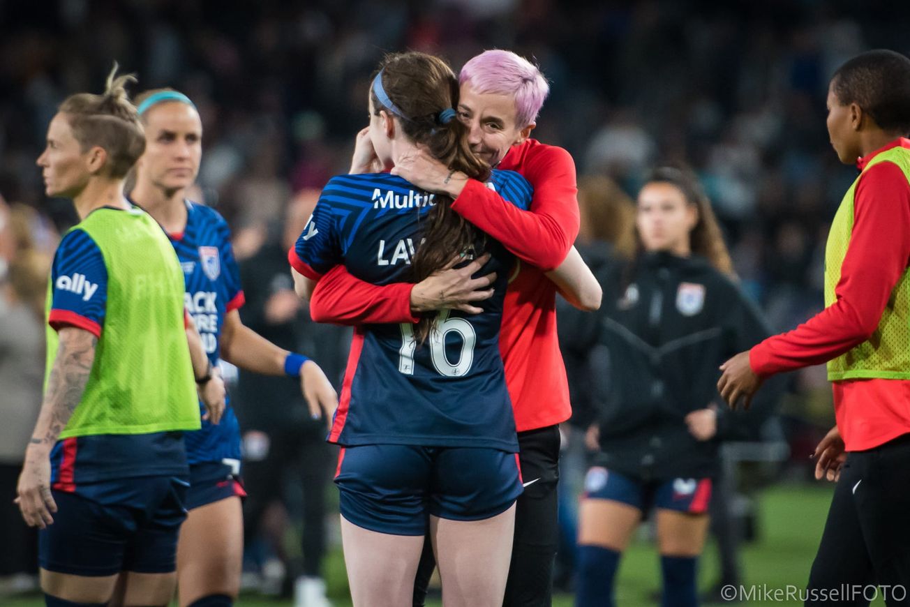 Megan Rapinoe embraces Rose Lavelle after the end of the 2023 NWSL Championship game.