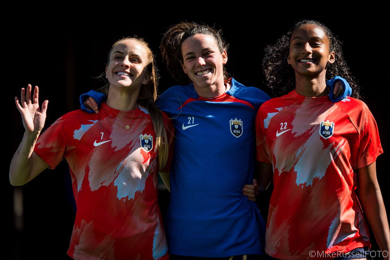 Defender Phoebe McClernon (middle) walks alongside teammates Nikki Stanton (left) and Ryanne Brown (right)
