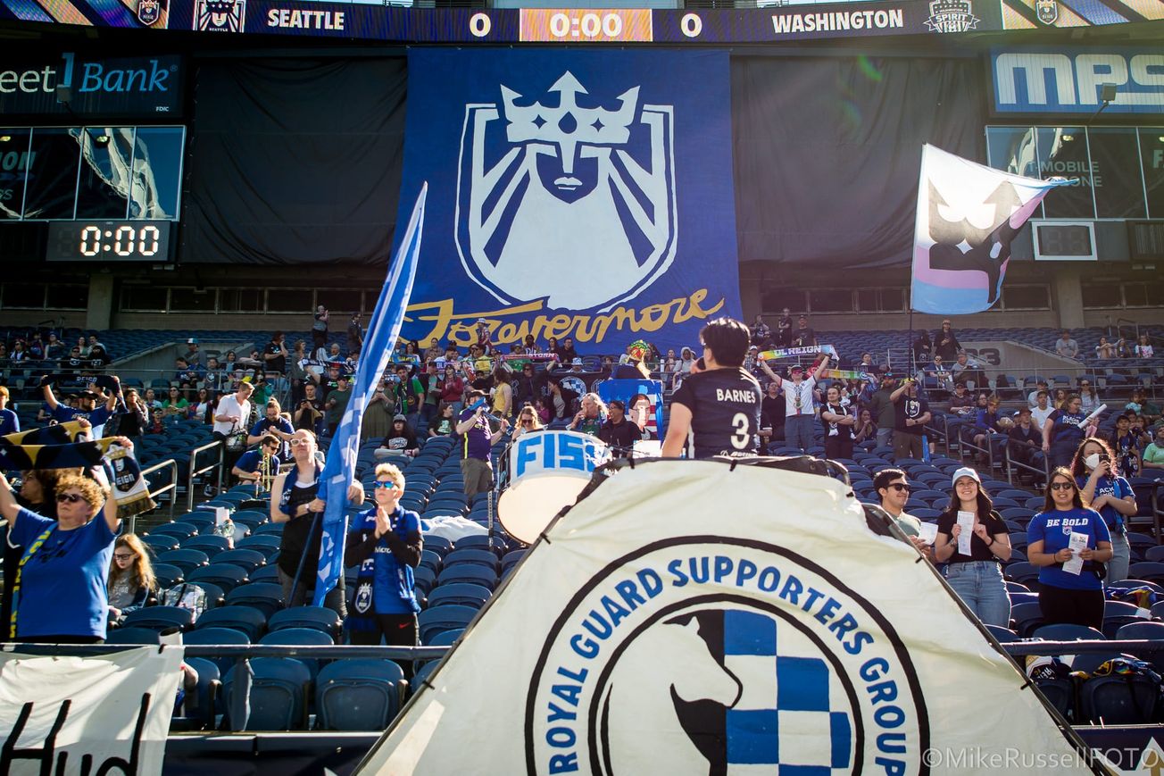 A view of the Royal Guard Supporters Group of Seattle Reign, with a tifo display that reads "Forevermore"