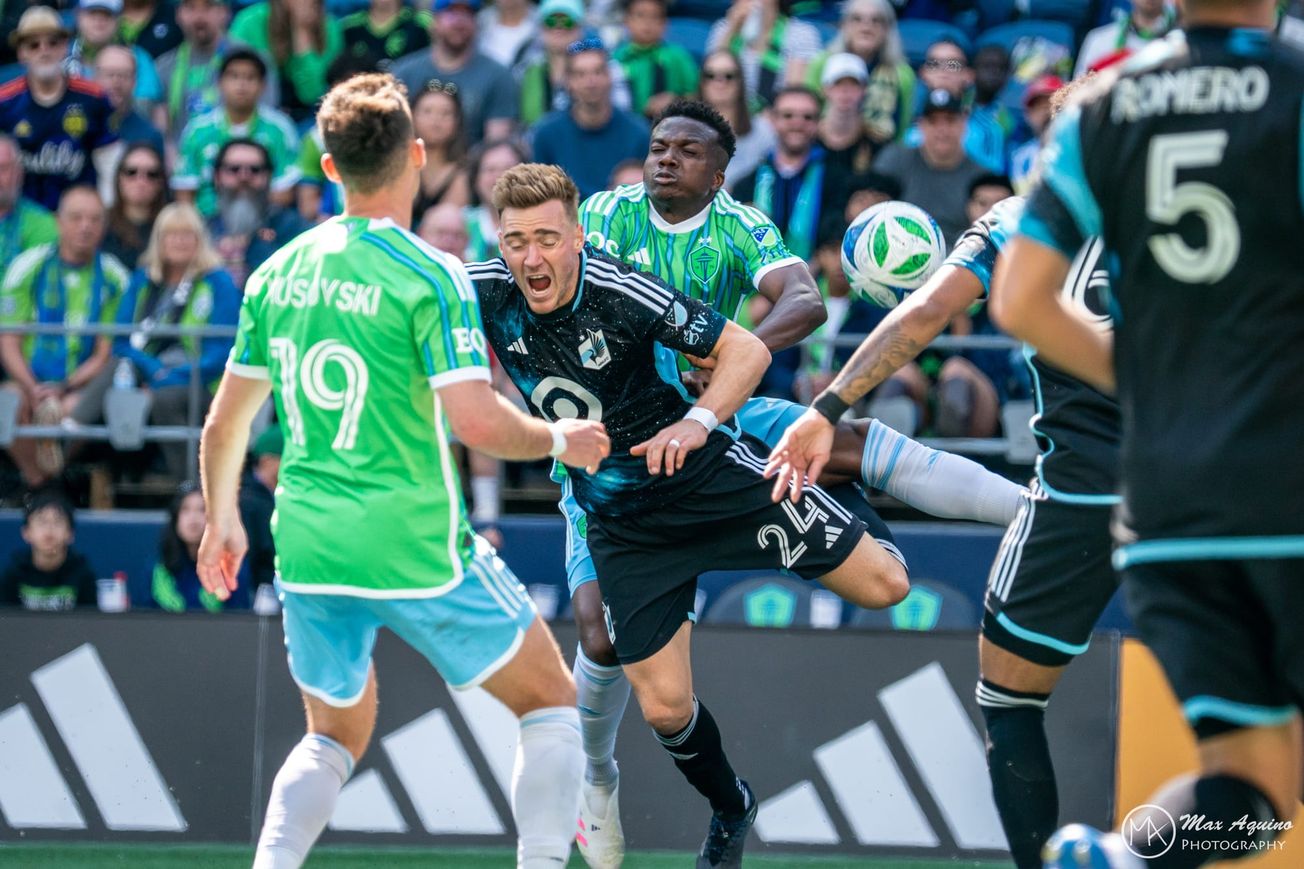 Danny Musovski looks on as Nouhou crashes into the back of Julian Gressel