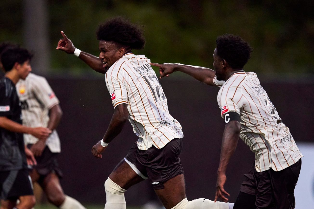 Ballard FC player Christian Engmann celebrates a playoff goal.
