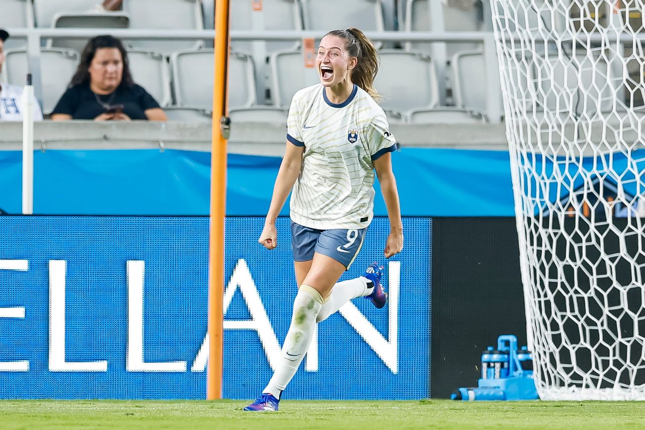 Reign forward Jordyn Huitema celebrates scoring a goal against the Houston Dash in an August 2025 match.