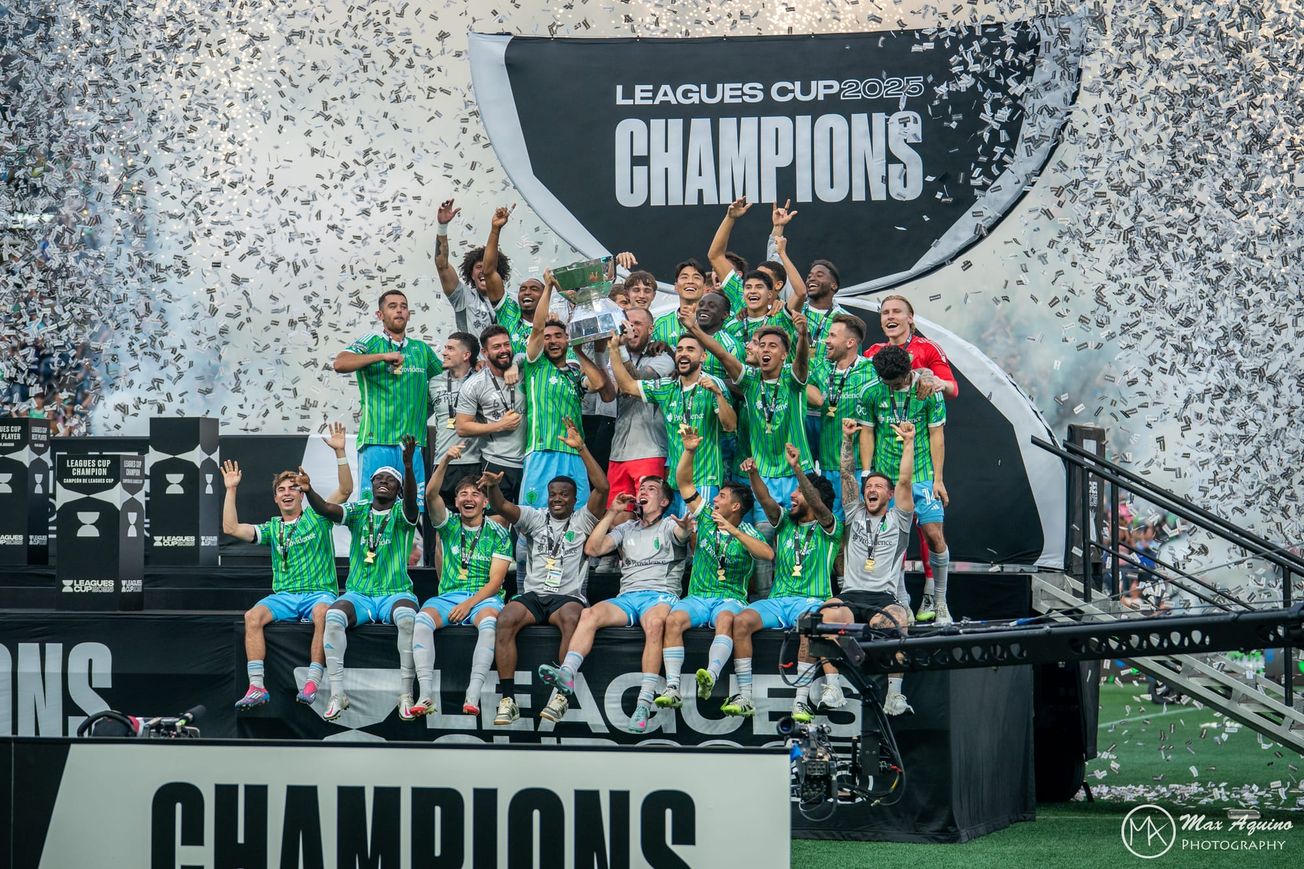 Sounders celebrate with the Leagues Cup t