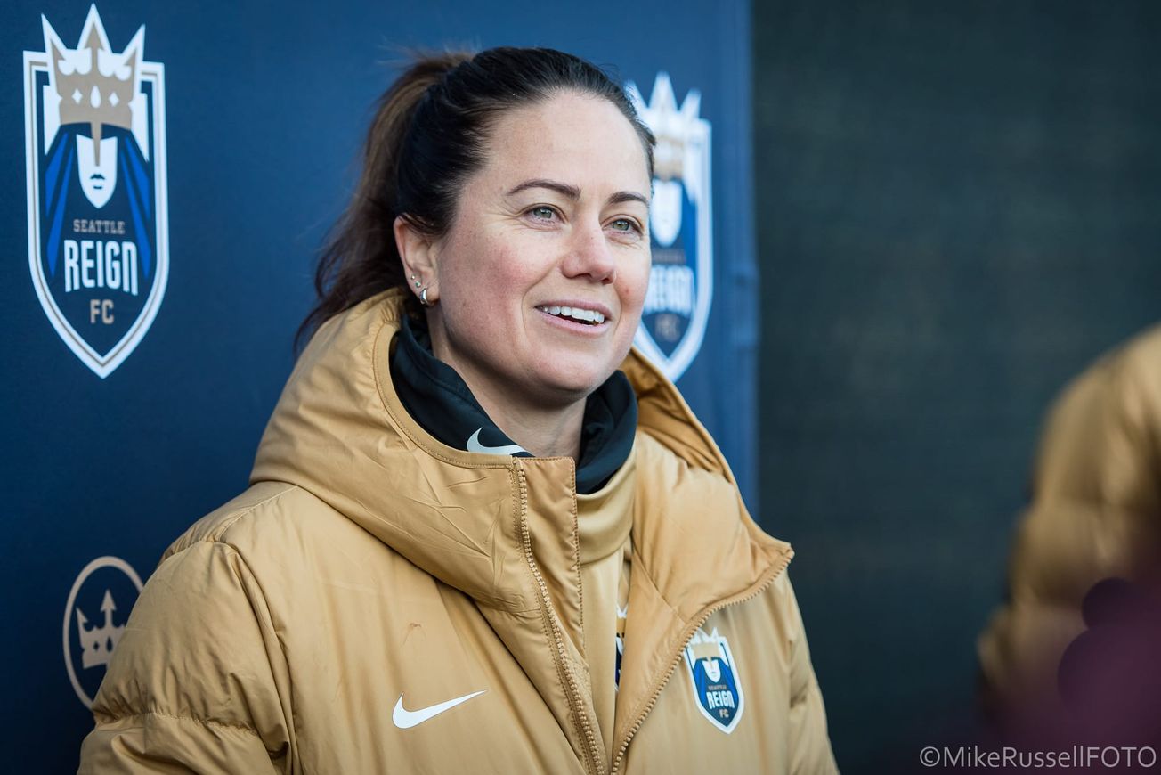 Reign defender Lauren Barnes speaks with media during the 2025 preseason.