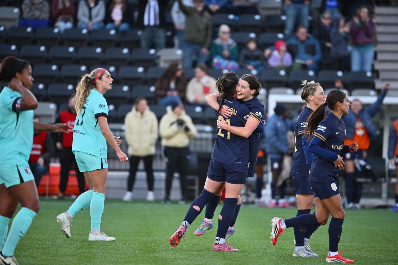 Reign ride first-half goals to 3-0 win over KC