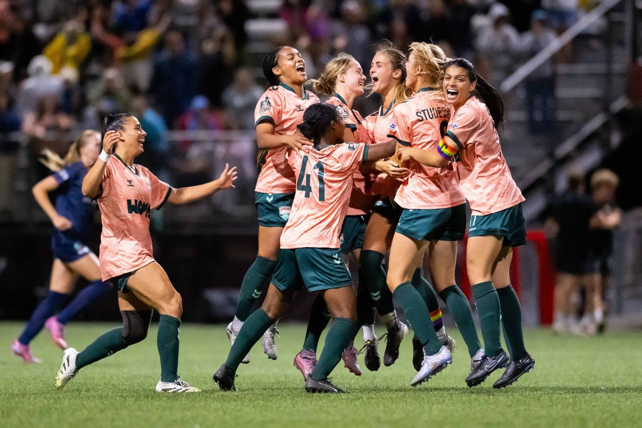 Salmon Bay FC Players celebrate together after winning the USL W National Semifinal