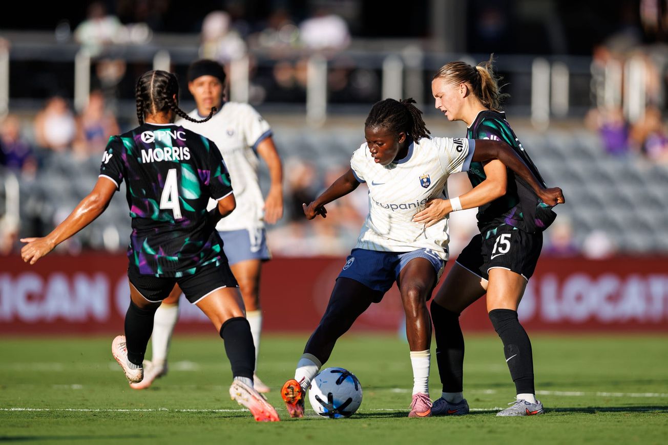 Reign score early, but fall 2-1 to Racing Louisville