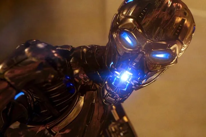 Sci-fi robot from "The Terminator 3: Rise of the Machines" with metallic skin and glowing blue eyes, exuding an intense and futuristic vibe.