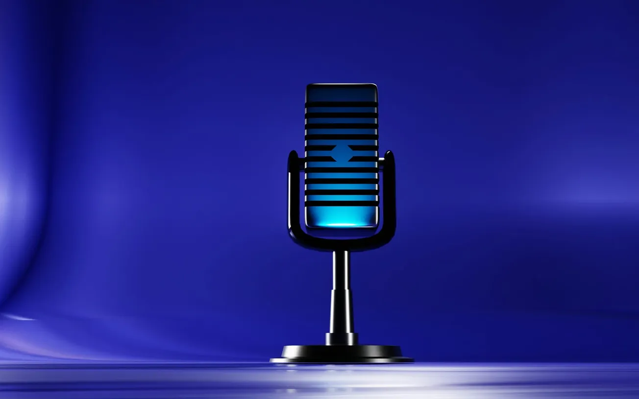 Retro microphone on a black stand against a smooth, deep blue background. The microphone emits a soft blue glow, creating a nostalgic and calm ambiance.