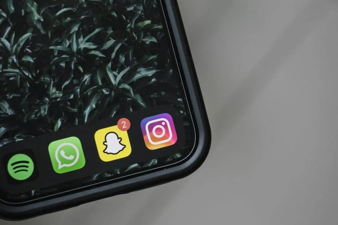 A close-up of a smartphone screen showing the Snapchat ghost icon.