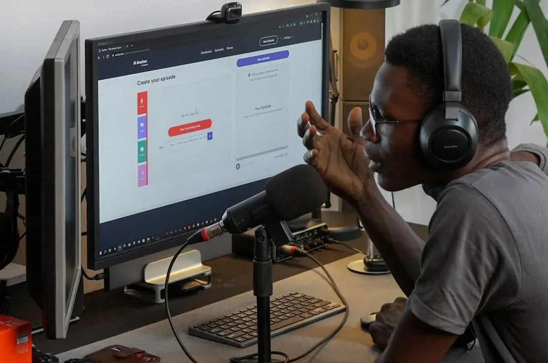 A content creator thoughtfully evaluates an audio speaker, symbolizing the critical assessment of gear beyond popular reputation for sound quality.