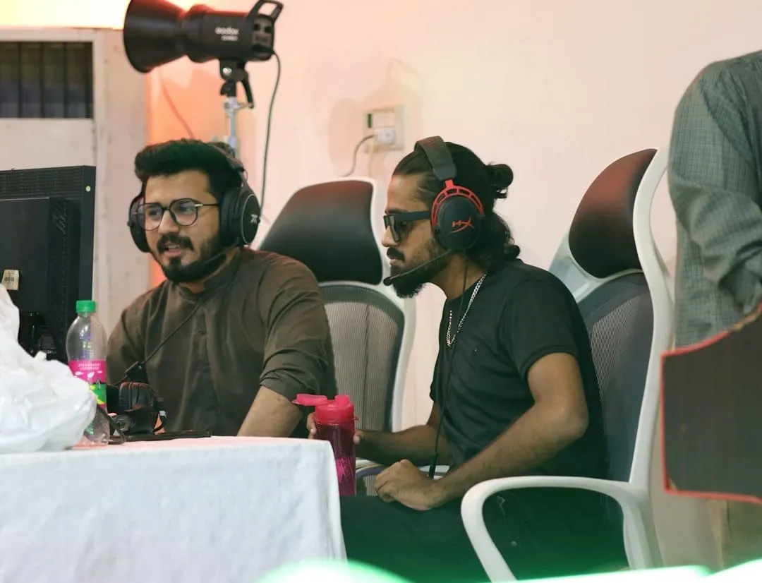 Industry leaders and content creators engage in lively discussions about podcasting and video trends at a professional media conference, highlighting collaboration and innovation.