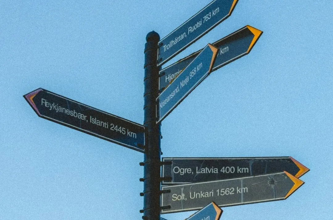 A digital crossroads signpost illustrates complex shifts in search, AI, and publisher relationships impacting online content strategy.