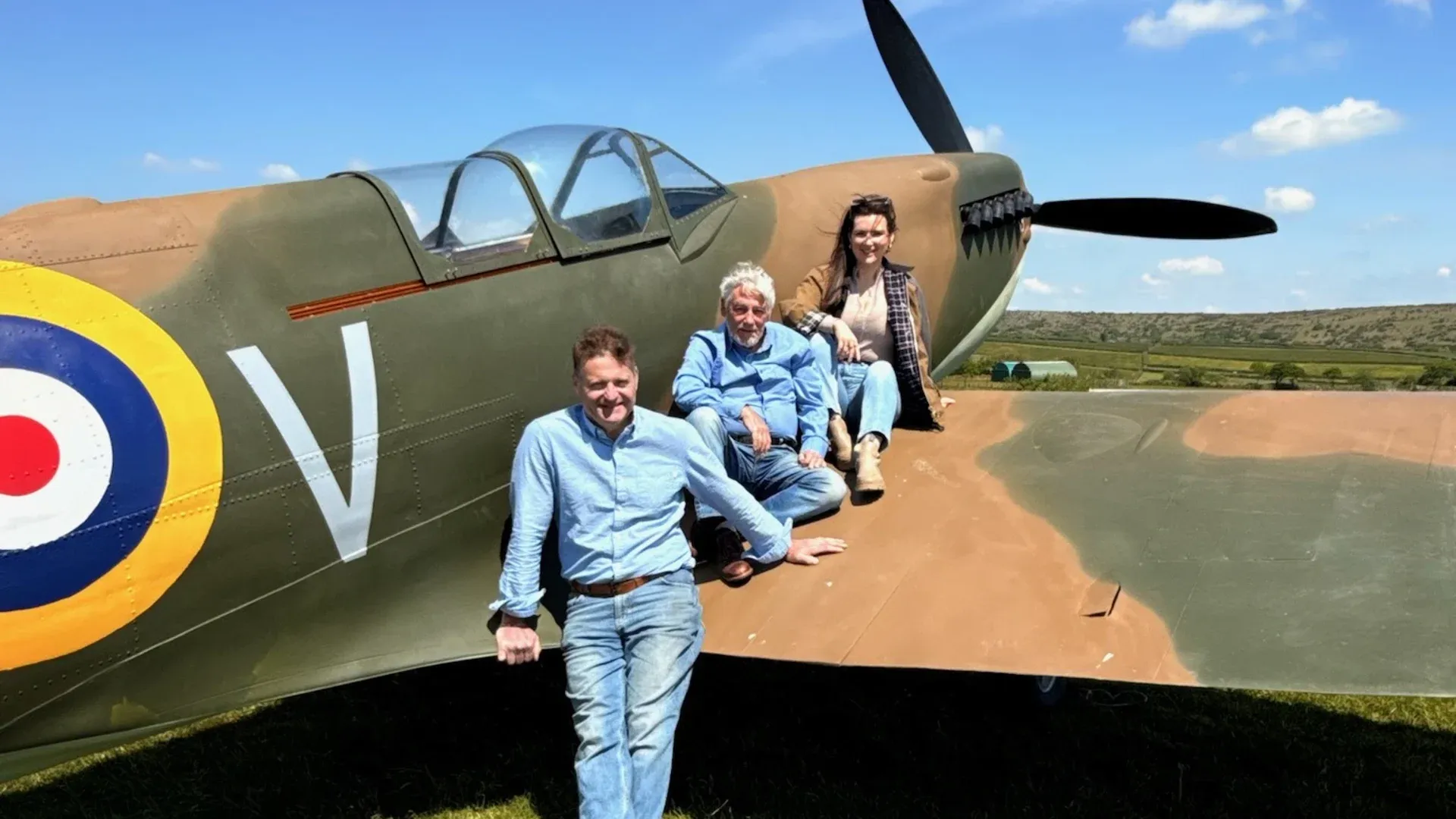 (from left) Jeremy Meeson, David Spencer Evans and Bridget Donaldson in front of an Aerolite Spitfire Type 433 (Aerolite Spitfire/PA)