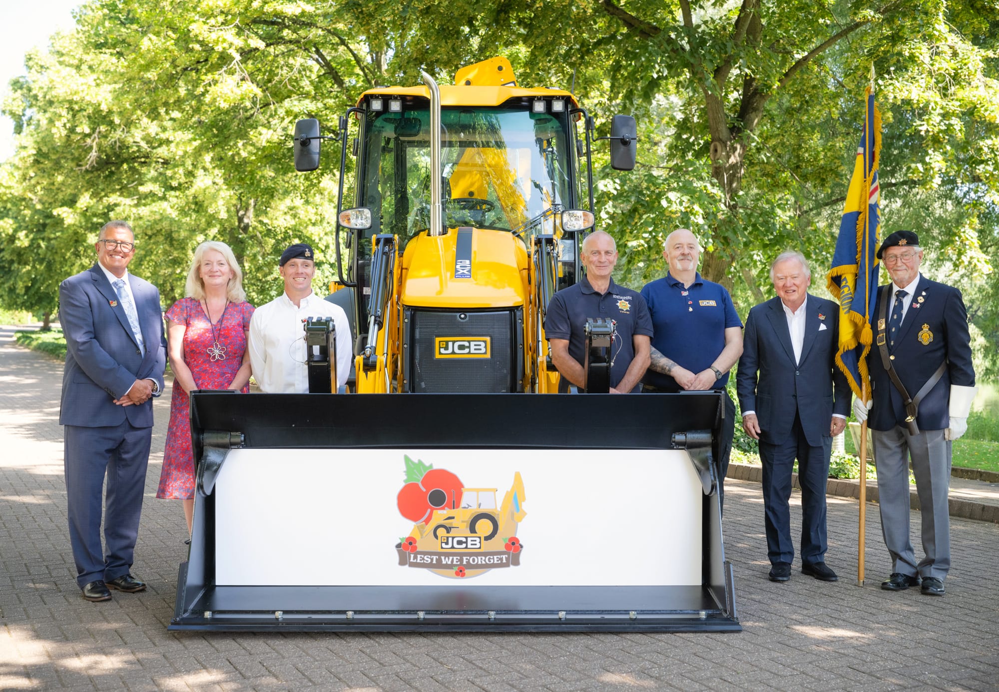 Retired Firefighter Digs Deep for Poppy Appeal With JCB Badge