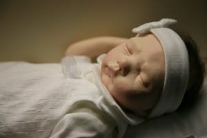 This baby isn't real. Do you know how you know that? Because it's asleep.